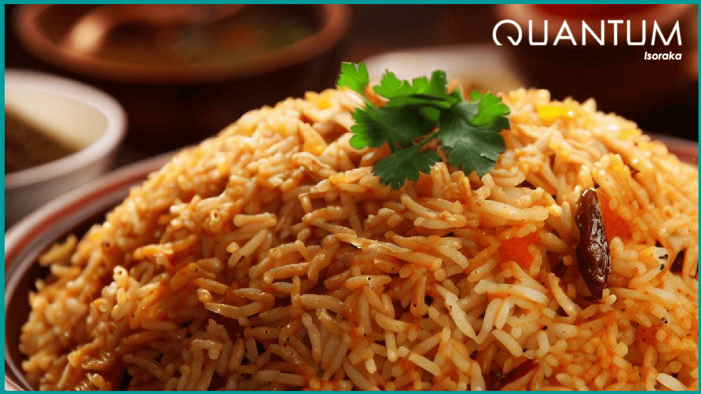 Plat de riz biryani aux grains colorés, présenté sur un visuel Quantum.