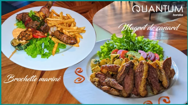 Duck breast and skewer with salad and fries